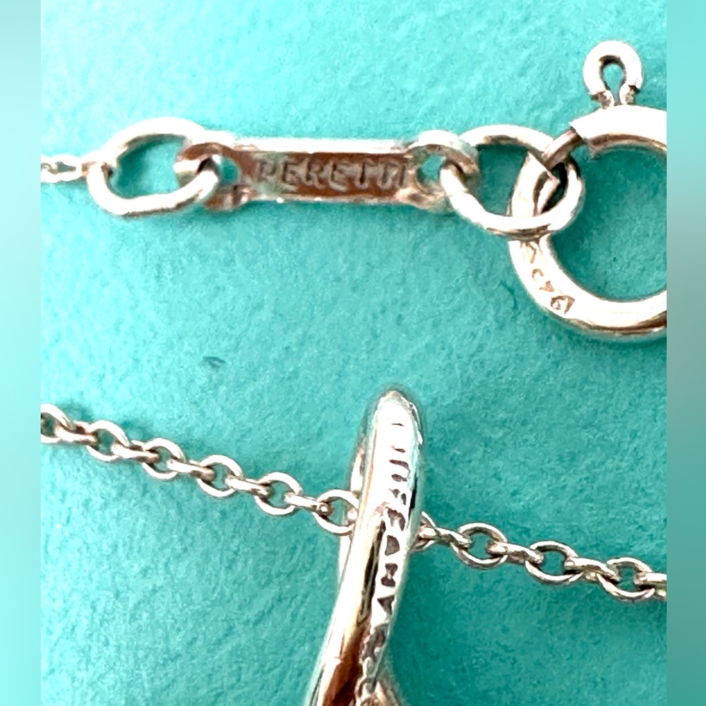 - AuthenticTiffany & CO. Elsa Peretti Infinity Cross Pendant Necklace. - Picture 5 of 11
